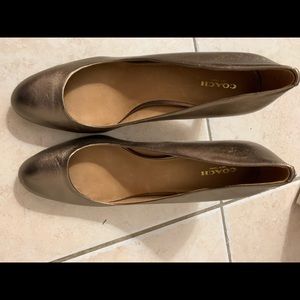 Coach pumps size 11. Never worn.